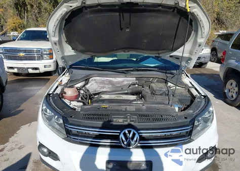 2014 Volkswagen Tiguan Sel z USA, uszkodzony, nr VIN WVGAV3AX2EW557592